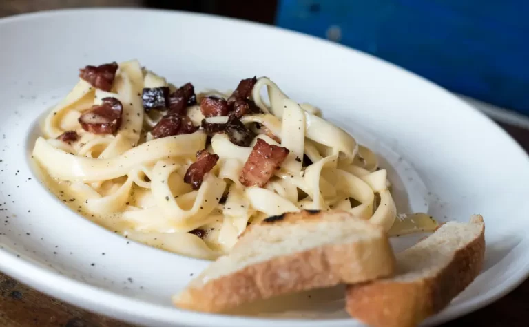 Carbonara Confidential: Uncovering the Rich History and Authentic Flavors of Italy's Beloved Pasta