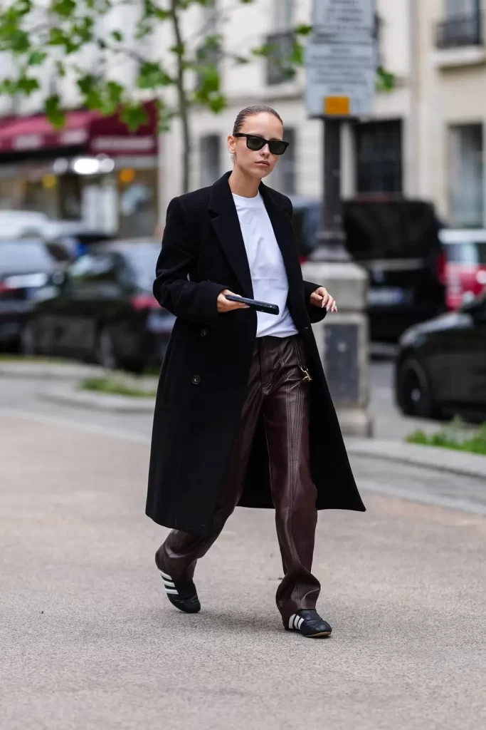 guest wears black sunglasses white oversized shirt black news photo 1729863802